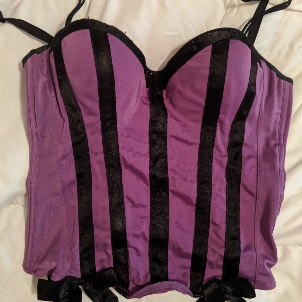 Fashion corset with bow accents.